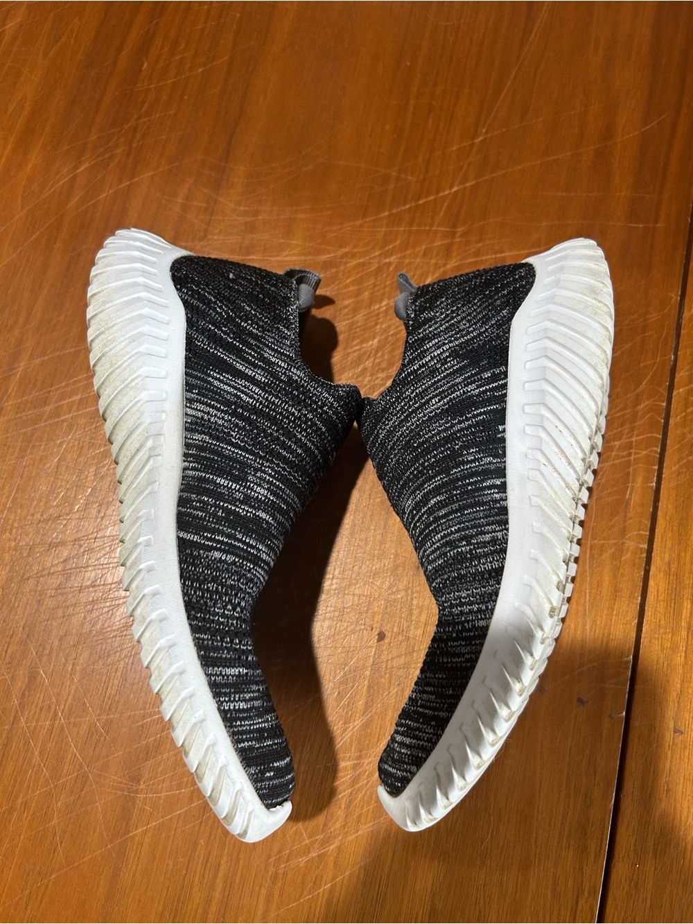 Skechers Black & White Slip-On Knit Sneakers - Picture 3 of 7